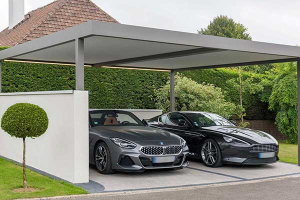 A fixed roof pergola installed by European Pergolas is perfect as an additional carport.